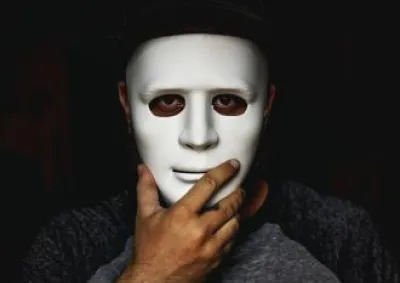 Person holding mask